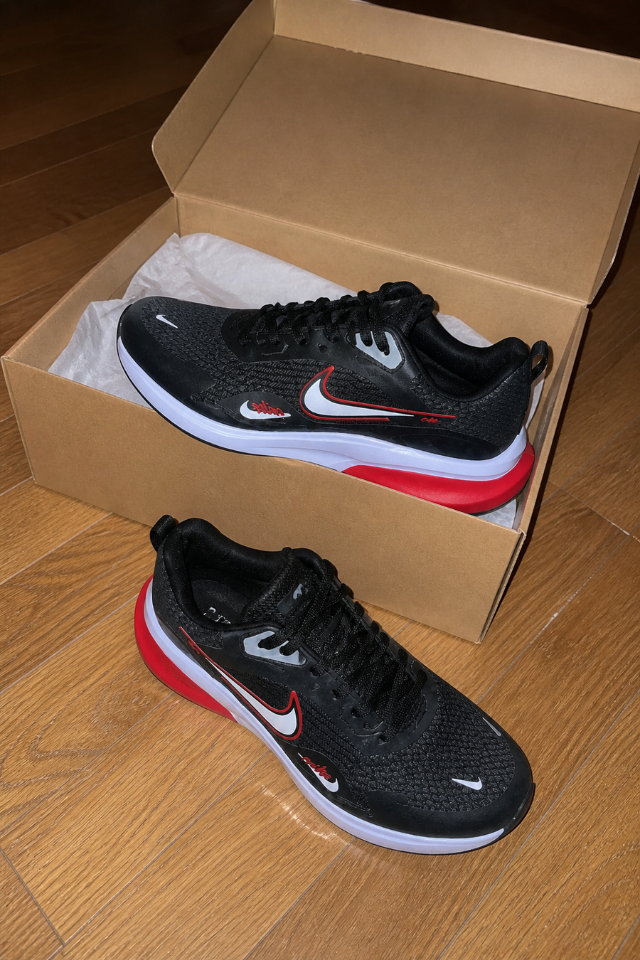 Nike Zoom 3 junto a su caja